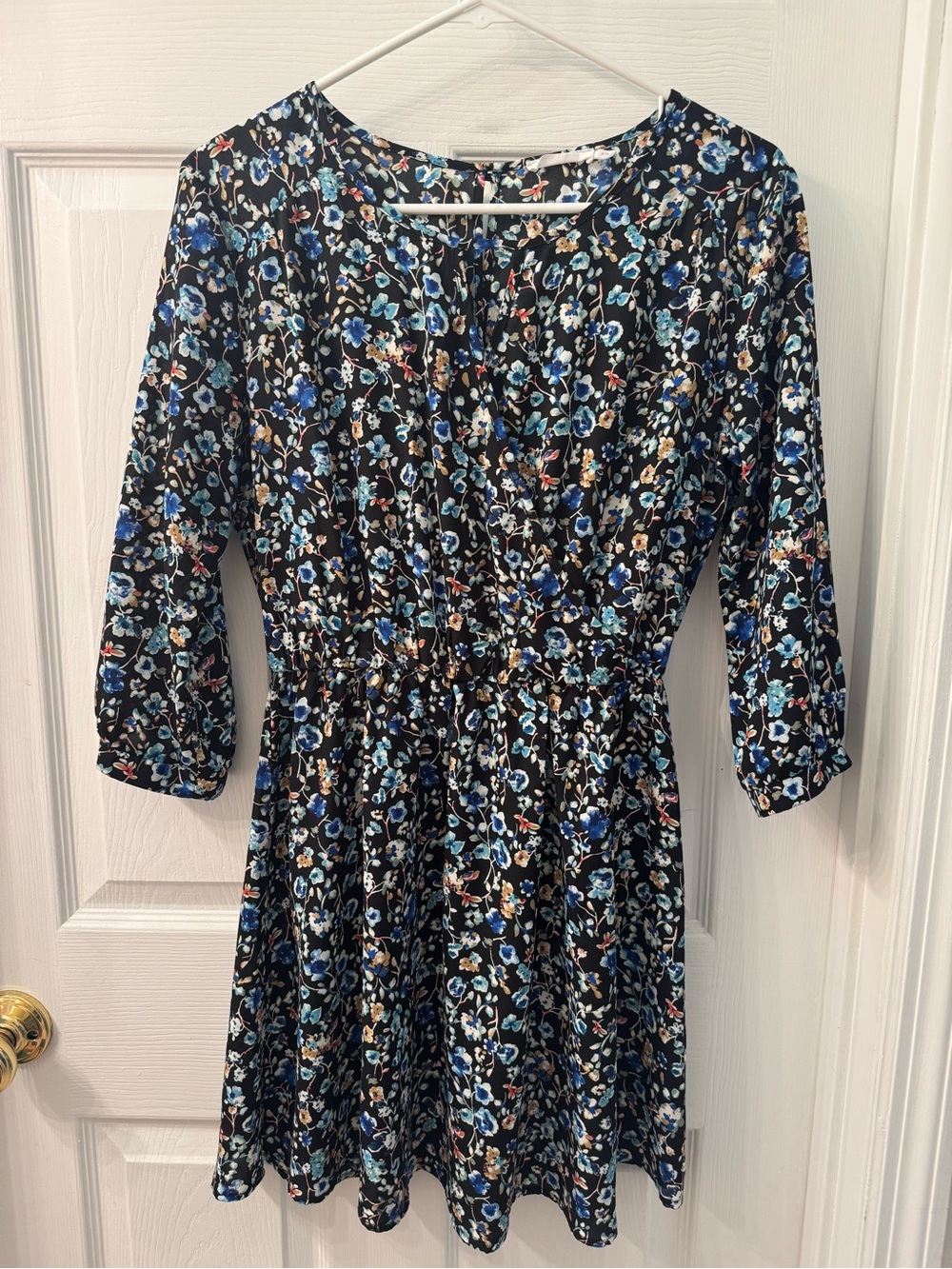 Lush Black Floral Top with Blue and Cream Blossoms